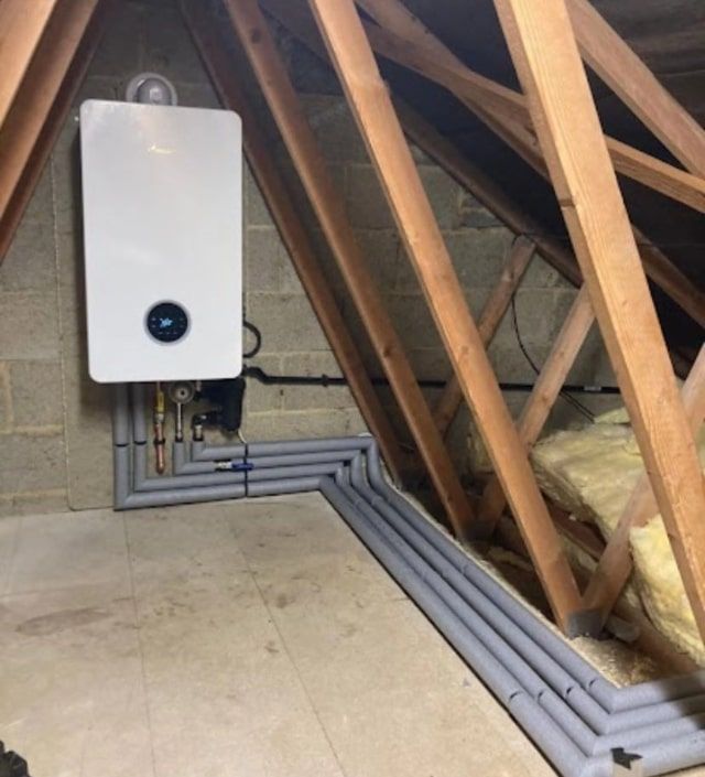 A modern boiler installed in a loft